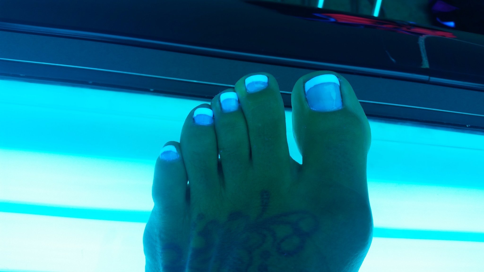 Ashton Blake's feet